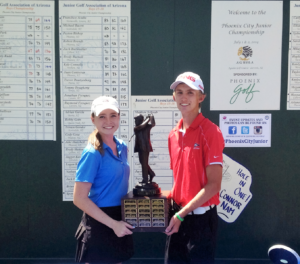 child winning a golf tournament